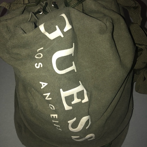 Guess duffer shoulder back bag with draw strings - Picture 2 of 4